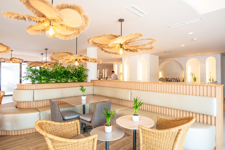 La Cala Resort clubhouse interior tables